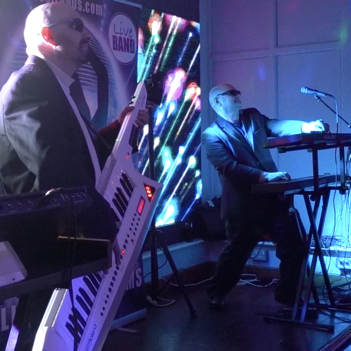 Kerry Rogers and Electro 90s party band playing 1990s dance music live